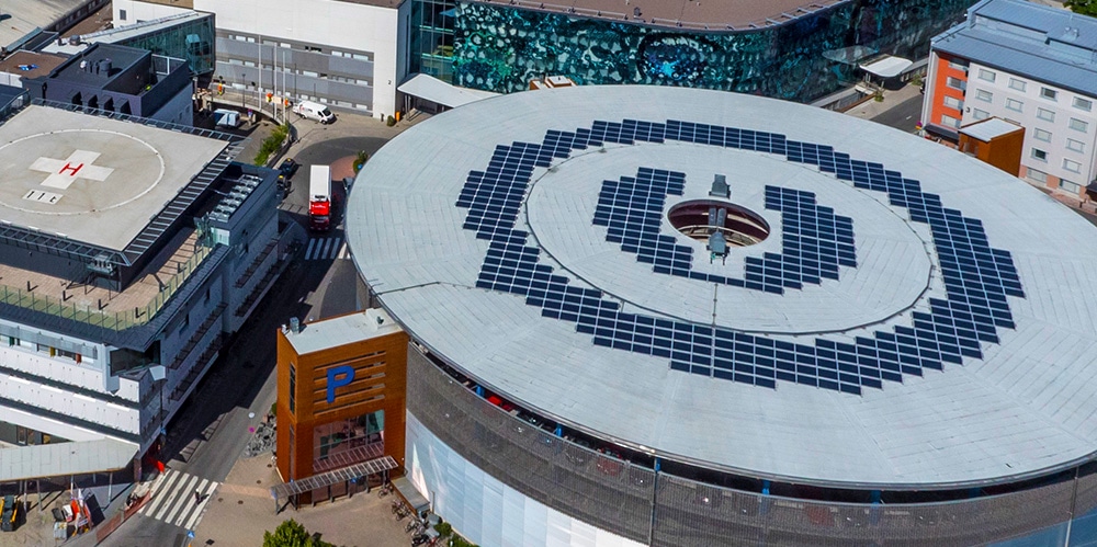 Aerial view of solar panels on top of hospital